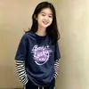 Camiseta de manga larga para niña 2026 nuevo estilo de otoño, top a rayas de algodón puro elegante y lindo con un diseño de dos piezas simulado
