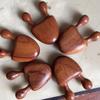 Venta al por mayor de fábrica raspador de nariz de sándalo de rana raspador de nariz de caracol masajeador de ojos de dial raspador de tendones puente nasal sándalo verde sándalo rojo raspador de nariz