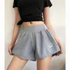 Pantalones de yoga falsos de dos piezas para mujer, nuevos pantalones de fitness de secado rápido para verano, pantalones cortos deportivos anti-exposición para entrenamiento de running