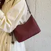 Bolso cubeta vintage de nicho de lujo para mujer, nuevo modelo 2026, textura tejida de alta gama, versátil para llevar al hombro, bajo el brazo y cruzado