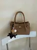 Bolso modelo nuevo 2026 transfronterizo, bolso de mano simple estilo coreano, bolso tipo cubo de moda de gran capacidad, bolso cruzado casual para el día a día
