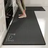 Tapete para piso específico para cocina, simple y práctico para uso doméstico, absorbe agua y aceite, es resistente a la suciedad, antideslizante, lavable, tapete de piso largo de tierra de diatomeas
