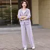 Conjunto de sudadera de dos piezas moderno y elegante para madres de mediana edad y mayores, nuevo estilo otoño 2026, traje deportivo elegante para damas