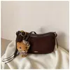 Bolso de mano pequeño cuadrado vintage de estilo francés, de nicho, con acabado mate para mujer, versátil y elegante para otoño, un bolso chic con forma de bollo con un toque de alta gama, apto para llevar al hombro o cruzado