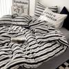 Venta al por mayor de ropa de cama de algodón bohemio de cuatro piezas, estilo japonés, pequeña, fresca, nórdica, sencilla, para familias.
