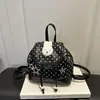 Mochila casual de lunares de estilo coreano de nicho para mujer, nueva mochila de conejo de dibujos animados 2026, bolsa de viaje para estudiantes