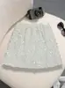 Falda Corta Brillante de Alta Resistencia Diseño de Moda Femenina Primavera 2026 Anti-Exposición Línea A Sexy Bodycon Falda 9890