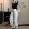 Pantalones anchos de dos rayas estilo retro americano para mujer, modelo primavera/otoño 2026, holgados casuales estudiantiles, rectos fluidos, pantalones deportivos