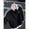 Chamarra a rayas de bloques de color estilo universitario americano con cuello alto para hombre, nueva colección otoño 2026, prenda exterior de moda de corte holgado con cierre de cremallera
