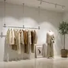 Loja de Roupas Suporte de Parede de Aço Inoxidável Suporte de Teto Prateleira de Exibição Lateral Barra Simples para Pendurar Roupas Femininas Prateleira de Exibição de Janela