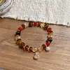 Nuevo brazalete apilado de piedra ojo de tigre estilo chino, moda nicho de alta gama, joyería versátil personalizada vintage simple para mujer
