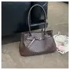Nova bolsa de palha tecida casual para o dia a dia para mulheres, bolsa de ombro de grande capacidade, bolsa de mão simples e versátil estilo coreano para o trabalho