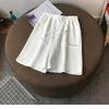 Verão 2023 novo casual estampado Net red Calças médias femininas estilo coreano soltas que combinam com tudo para casa esportes roupa exterior shorts femininos