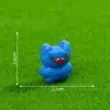 Nuevo producto transfronterizo: adorables figuritas de monstruos pequeños con una sonrisa dentuda, perfectas para paisajes en miniatura, decoraciones DIY y como pequeños adornos para coche