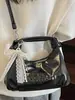 Bolsa de Mão de Couro Encerado a Óleo de Moda Coreana Feminina 2025 Nova Nicho Commuter Moda Elegante de Alto Valor Bolsa Transversal