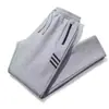 Pantalones Deportivos Finos de Verano para Hombre Largos Rectos Bolsillo Cremallera Antirrobo Comercio Exterior Stock Listo Venta al por Mayor Pantalones de Chándal Casuales