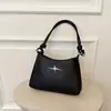 Bolso de axila con decoración de estrella de cuatro puntas de metal con correa para el hombro anudada, bolso de hombro pequeño estilo baguette, estilo dulce y fresco, bolso de mano simple, bolso cruzado