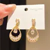 Pendientes de plata chapada en oro real de 18 quilates con aguja de plata y circonita en forma de gota de agua, pendientes de lujo ligero de alta gama, accesorios de oreja exquisitos de nicho