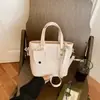 2026 popular nuevo bolso de hombro cruzado con textura de moda, bolso de mano tipo cubo vintage de gran capacidad con textura para mujer
