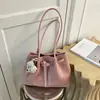 Bolsa Feminina de Ombro Único Nova Coleção Primavera/Verão 2026 Textura Trançada Temperamento Simples Bolsa de Axila Bolsa Tote de Alta Qualidade para o Trabalho