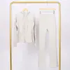 Conjunto Lulu Df de Jaqueta com Capuz Estampada e Calça Flare, Gola Alta Justa, Zíper Dourado Elástico, Roupa para Fitness Yoga
