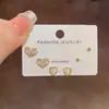 Conjunto de pendientes de tres piezas de moda coreana y japonesa, exquisito, de lujo ligero, con corazón de circón, elegantes, sencillos, versátiles, de alta gama, pendientes súper brillantes