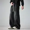 Calça jeans masculina 2026 novo estilo primavera e outono, patchwork personalizado, calças plissadas de perna reta e perna curva, calças largas com lavagem retro desgastada