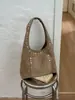 Bolso de hombro retro con tachuelas para mujer, estilo desierto simple de gran capacidad, moda europea y americana, verano 2025