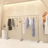 Tienda de ropa moderna simple soporte de exhibición especial de acero inoxidable para piso estante de exhibición de perchas para tienda de ropa de hombre y mujer