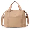 Nova Bolsa Feminina Japonesa Cor Sólida Bolsa Tote Bolsa de Ombro Casual Simples Bolsa para Passeio com Bebê Bolsa de Mão em Lona Atacado