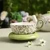 Juego de Té de Cerámica con Tazas, Platillos y Tetera para Uso Doméstico, Adecuado para Regalo, Serie de Rama y Vid de Cerámica con una Cesta Portátil