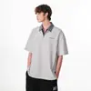 Camiseta de manga corta tipo polo de dos piezas falsas para hombre, verano, moda urbana, holgada, casual, versátil, gofre, top de pareja de media manga
