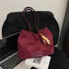 Bolsas de Nicho de Alto Padrão Transfronteiriças Bolsas Simples Femininas Moda Nova Primavera Cor Pura Bolsas de Ombro Bolsas Femininas