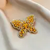 Broche Borboleta de Vidro de Luxo de Alto Padrão Transfronteiriço, Cristal Retro Incrustado com Diamantes, Elegante e Estiloso Broche para Blazer de Terno para Mulheres