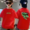 Camiseta de algodón puro de manga corta para niños, nuevo estilo de verano con estampado de letras de dibujos animados, top holgado de moda para bebé de media manga