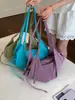 Bolso de mujer de diseño nicho de alta calidad transfronterizo, nuevo para la primavera de 2026, simple, de hombro, para debajo del brazo, cruzado, tipo bolsa de albóndiga