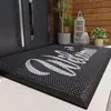 Alfombrilla de entrada de goma simple con diseño calado para raspar el barro, alfombrilla exterior de malla elástica para quitar el polvo, antideslizante con diseño de letras "Welcome"
