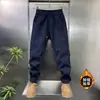 Producto Nuevo de Invierno 2025: Pantalones Casuales para Hombre, Lujosos, Resistentes al Frío, Cortavientos, Cálidos, Cintura Elástica, Terciopelo de Algodón Europeo, Sarga, Engrosados y Forrados de Felpa