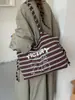 Bolso de hombro de rayas diario transfronterizo nuevo para niñas, bolso tote de leopardo de gran capacidad, bolso de rayas para estudiante para ir a clases