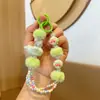 Cadena colgante para teléfono móvil con cuentas de bola de pelo al por mayor, avión, dibujos animados pintados a mano, llavero para bolso, llavero de pulsador, pequeño regalo