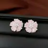 Pendientes de borla con flor de trébol de circonita vintage con un toque de alta gama, pendientes versátiles y de moda al por mayor