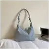 Bolsa de Ombro/Axila de Cor Sólida de Grande Capacidade para Uso Diário Feminina Moda Verão 2026 Nova Bolsa Tote Casual Bolsa Transversal