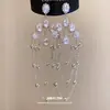 Aretes de aguja de plata con diamantes, borlas de mariposa de perla hueca, aretes de lujo ligero de alta gama, aretes de diseño único de nicho para mujer