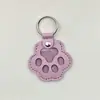 Novo pingente memorial criativo para guardar pelos de pet, porta-cartão de acesso à porta anti-perda, pingente de chaveiro de pata de cachorro