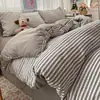 Juego de ropa de cama de cuatro piezas Clase A, algodón puro, seguro para bebés, sábana bajera y funda de edredón de gasa de doble capa, juego de tres piezas para estudiante de dormitorio individual 4