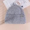 Gorro de lana con lazo dulce de Corea del Sur para mujer, gorro de lana para otoño e invierno, grande, combinable, cálido, con protección para las orejas, gorro de punto pequeño.