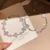 Pulsera de diseño nicho con flor de circón estilo francés, simple y versátil, pulsera exquisita de nácar, joyería de lujo ligero y alta gama