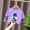 Camiseta base para niño 2026 nuevo modelo camiseta de manga larga a rayas patchwork para niños top de algodón puro otoño para niños mayores