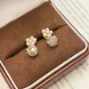 Brincos Empilhados com Acabamento em Diamante Pérola Lua de Cristal Novo Estilo Liga Metálica Empilhados Diamante Super Brilhantes Flor de Pérola Brincos de Tarraxa