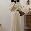 Conjunto de duas peças de tricô casual, cardigã e saia, para mulheres, nova coleção outono e inverno, adequado para corpo tipo pera, disfarça e afina a silhueta